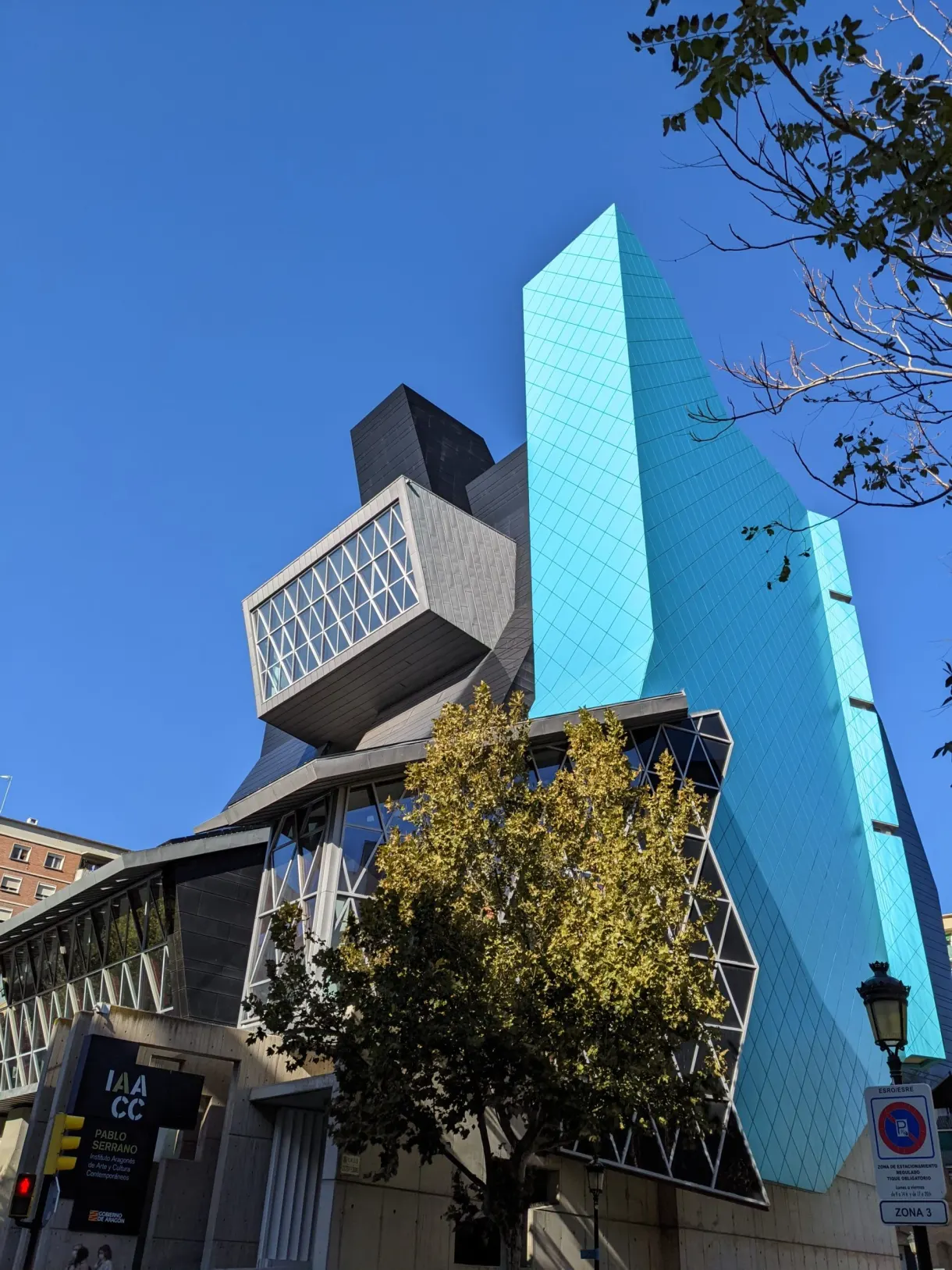 Contemporary building with blue and black facets