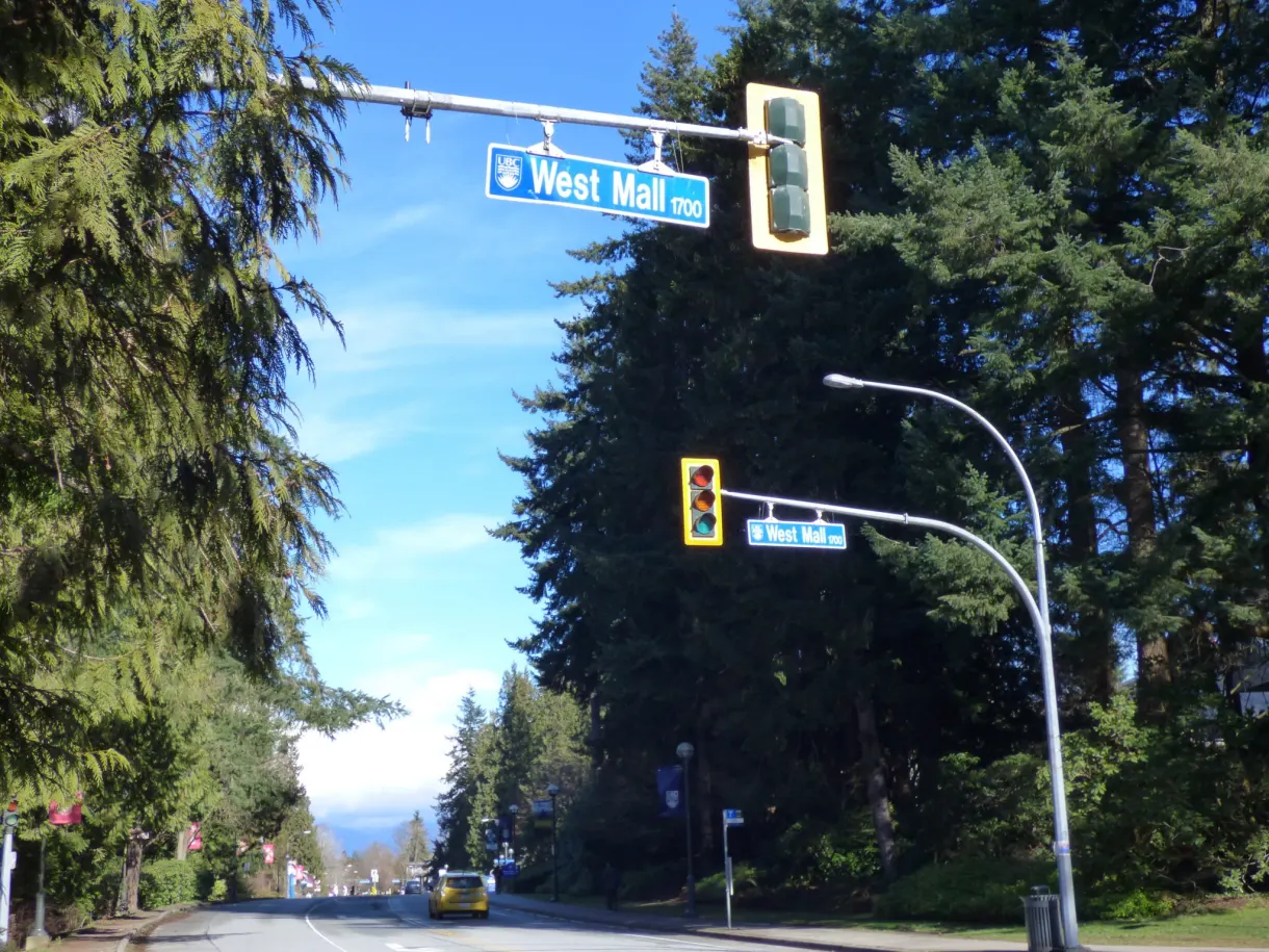 Campus crossroads marked by the West Mall sign