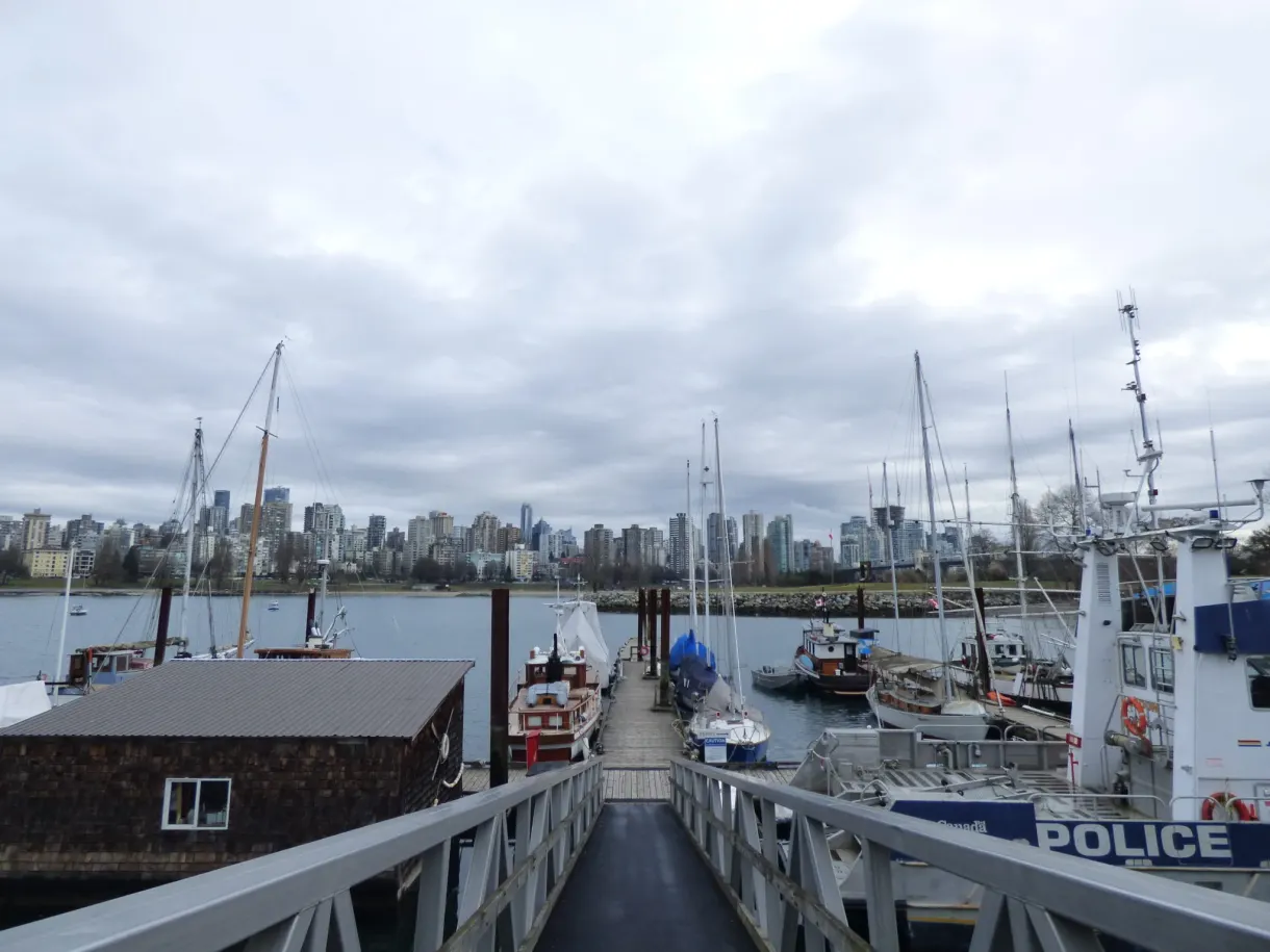 Marina pontoon and moored police launch