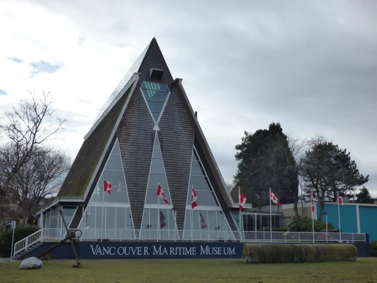 Triangular building of the maritime museum and its flags