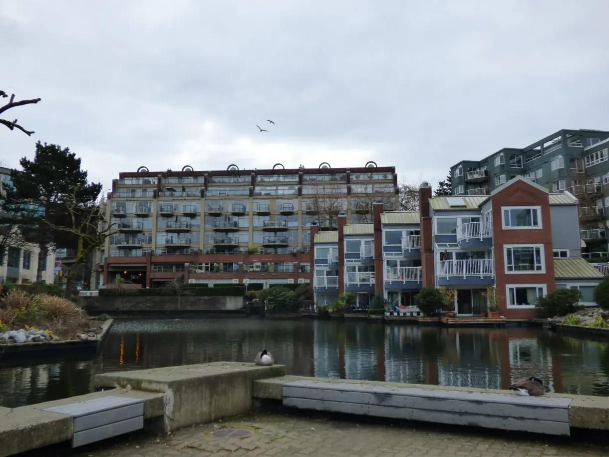 Brick buildings beside the basin and concrete quay