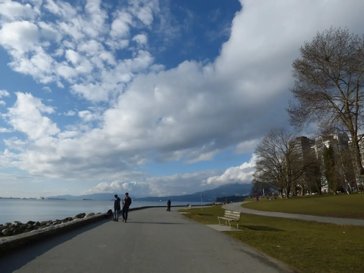 Curving coastal promenade running along the riprap