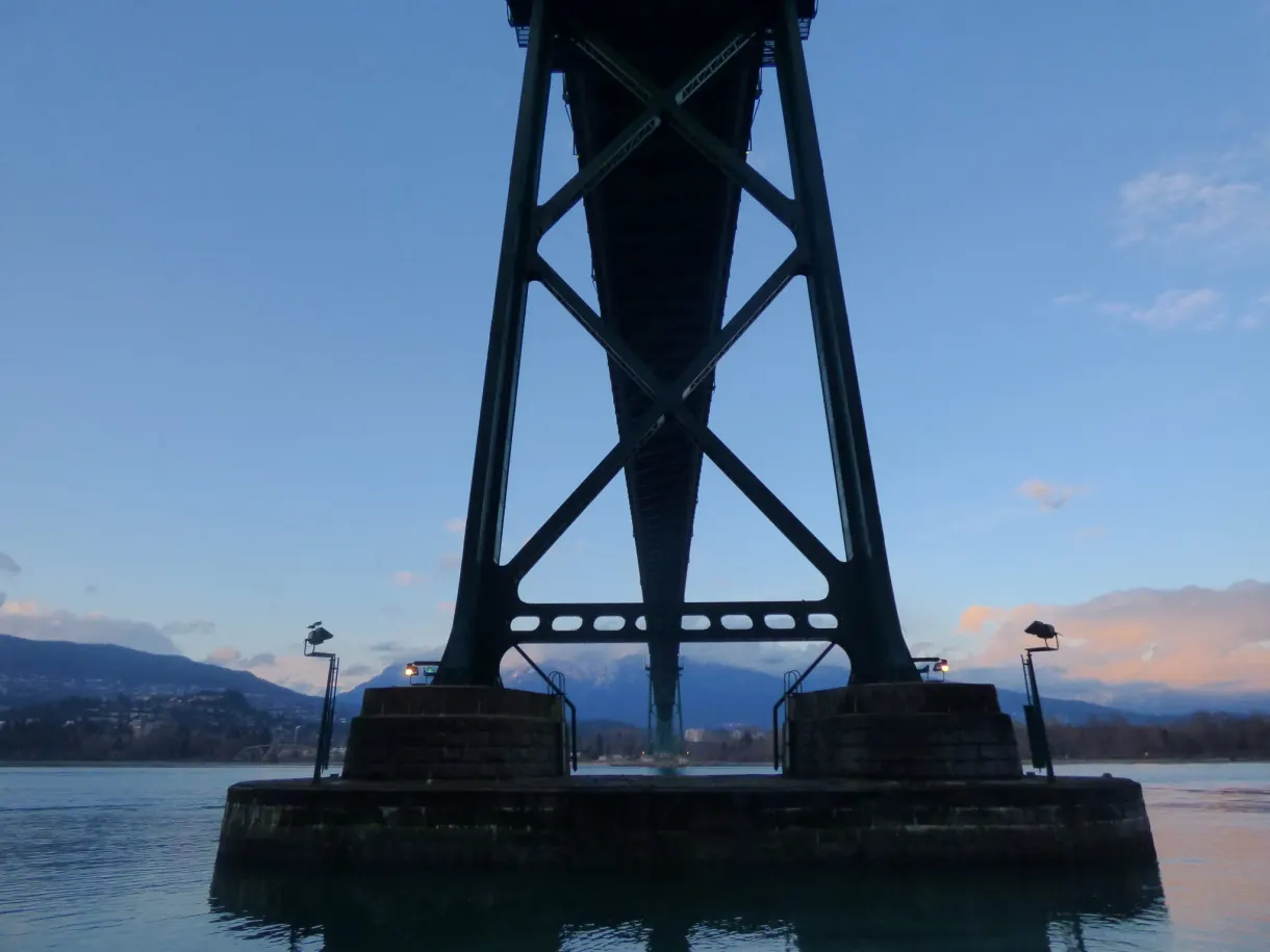 Steel pier of the bridge rising above the water