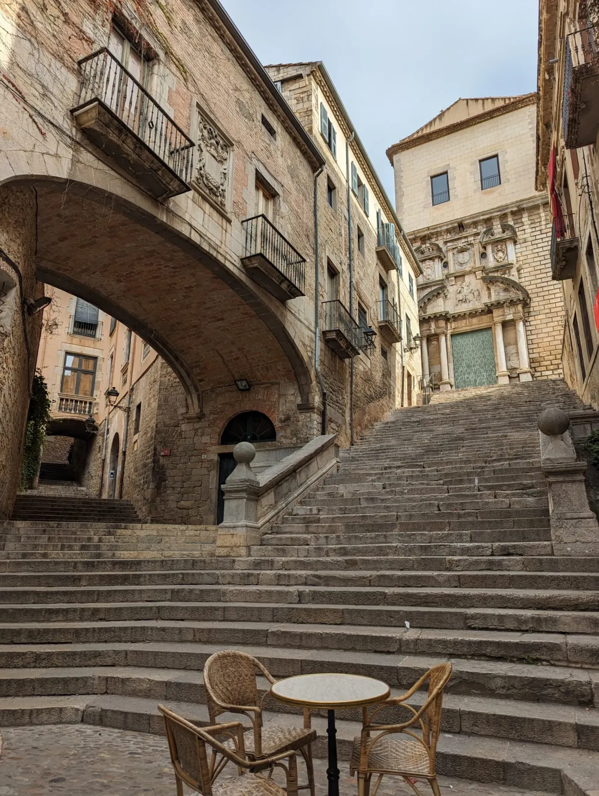 Monumental staircase and stone arcades of the historic centre