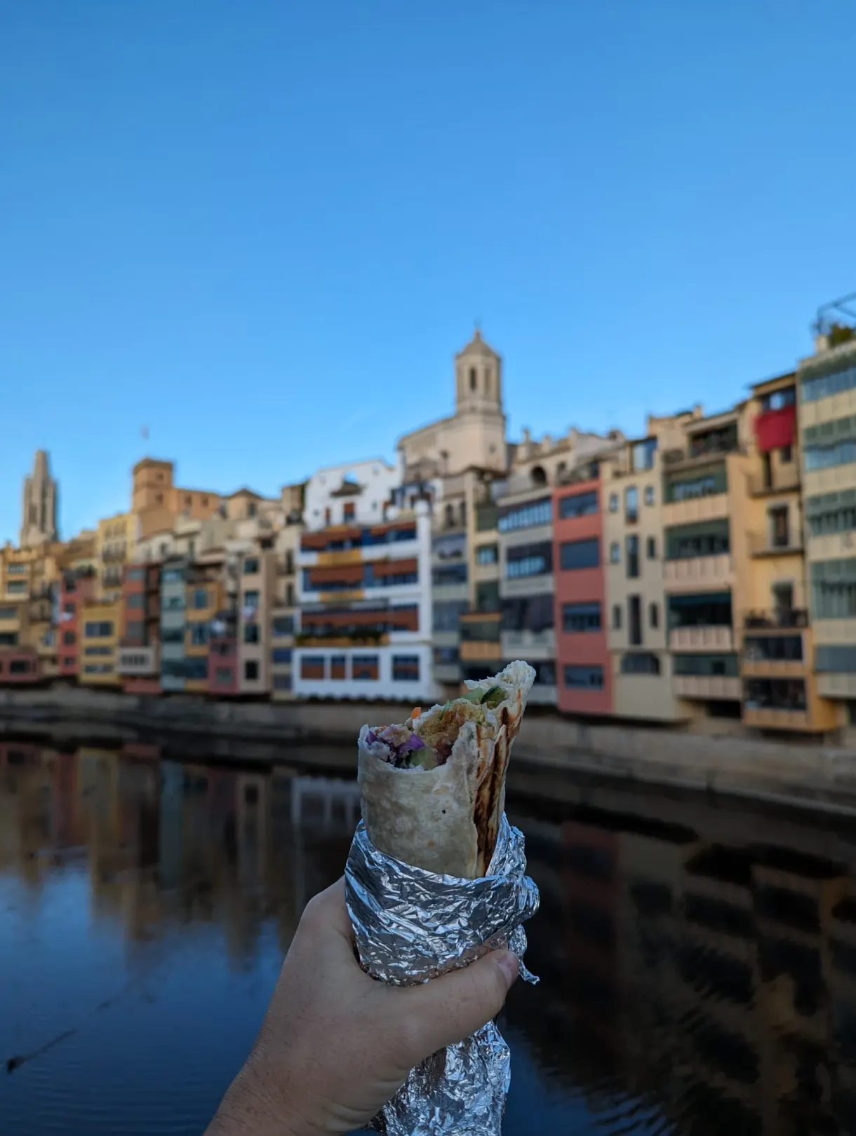 Wrap in its foil held up in front of the houses of the Onyar