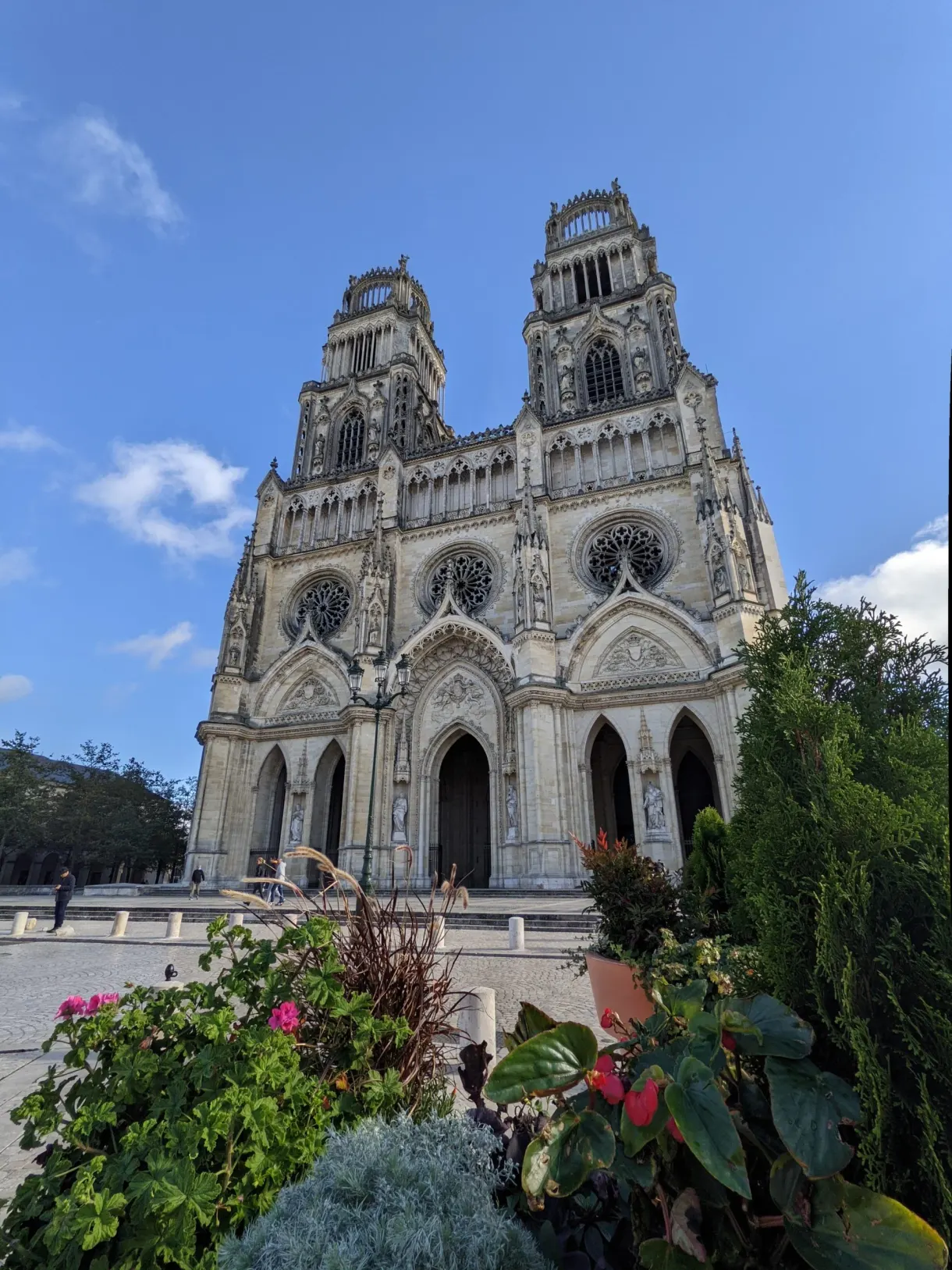 Flower beds in the foreground of the cathedral's two towers
