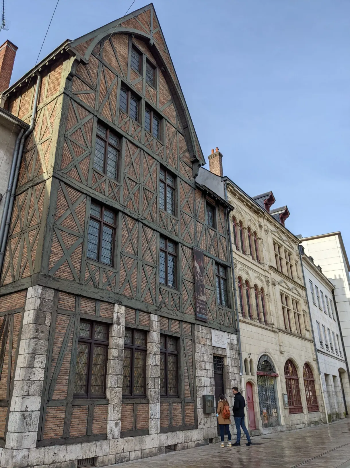 Large Renaissance house with half-timbering and lattice work