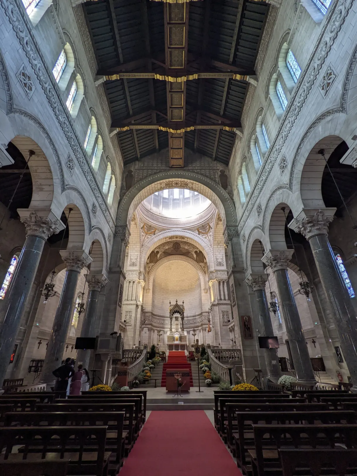 Nave of the basilica and its red carpet between the pews