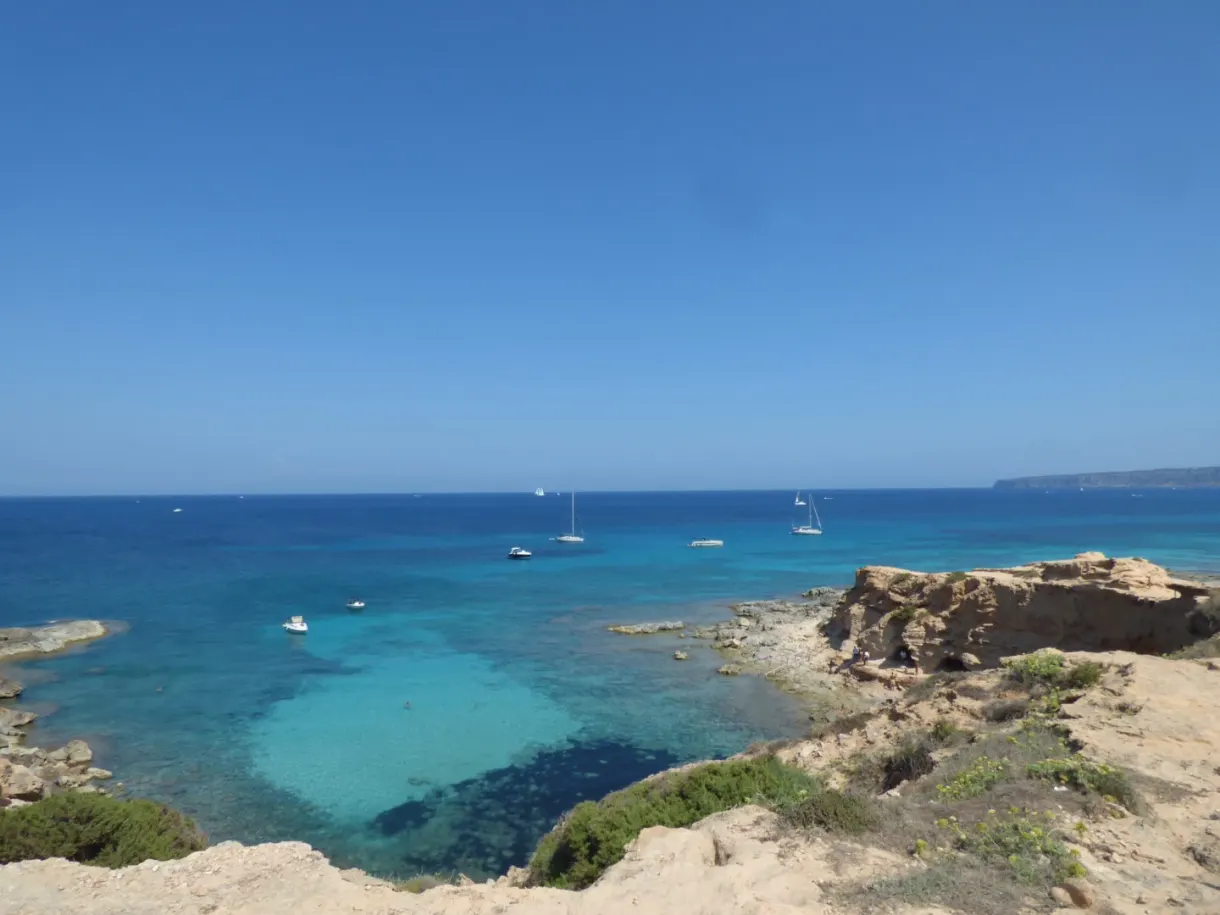Blue cove seen from the top of the ochre cliff