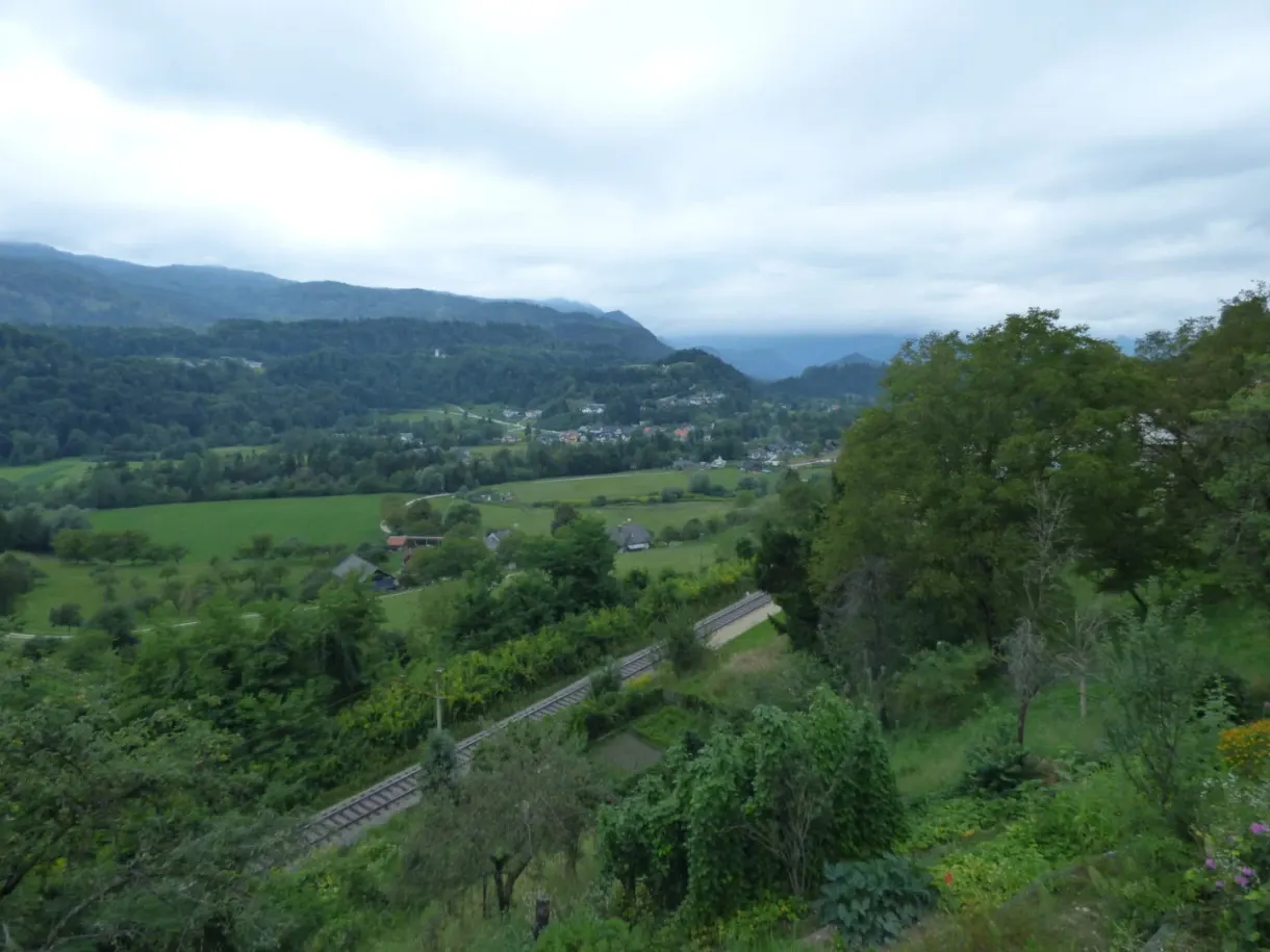 Green hills and wooded valley down below