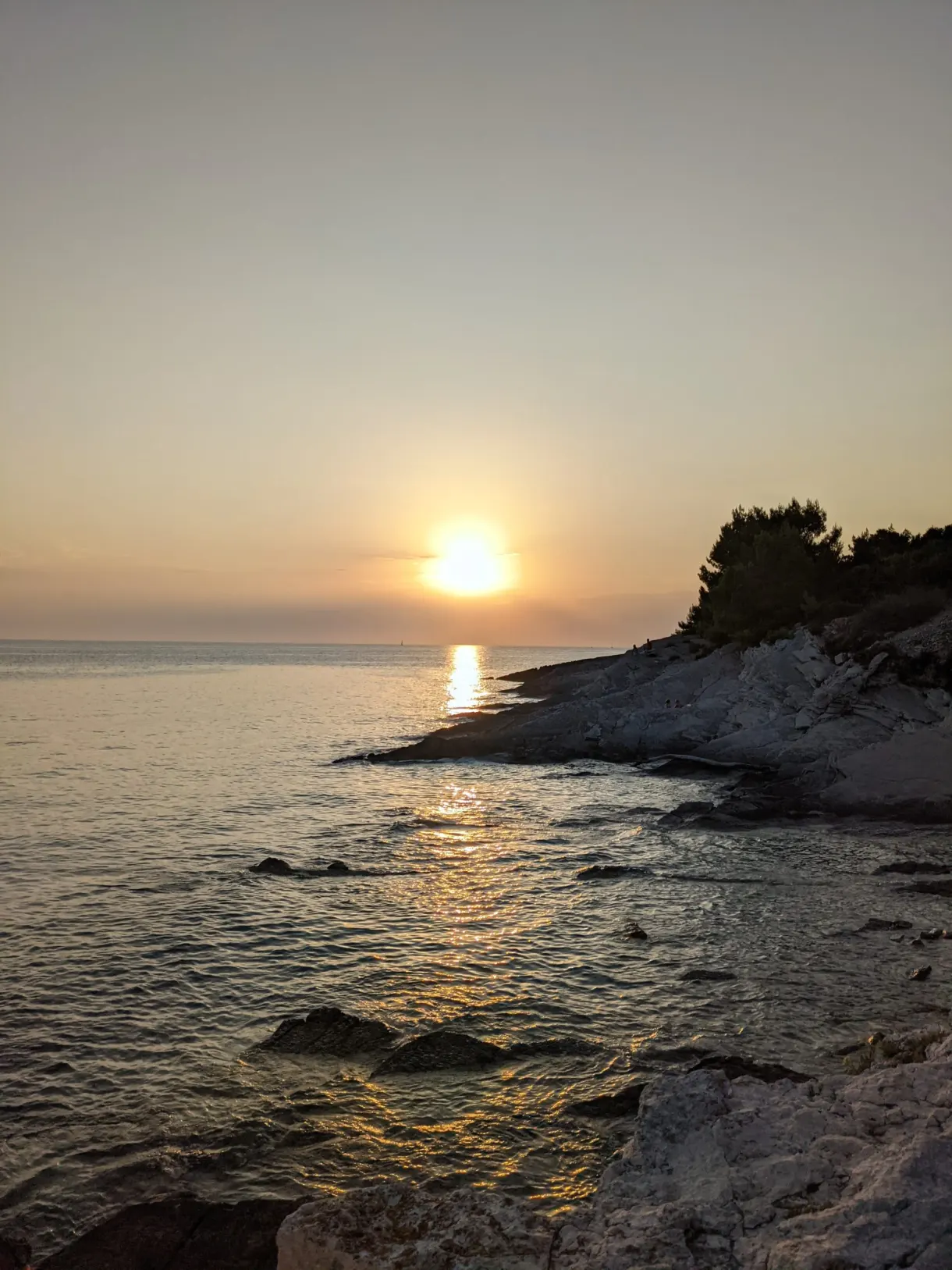 Sun setting over the sea from the tip of Kamenjak