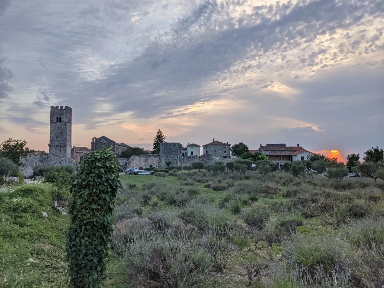 Tower of Sveti Lovreč at sunset behind the lavender fields