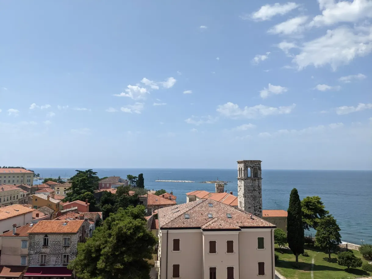Rooftops of Poreč and the Adriatic Sea seen from the top of the bell tower