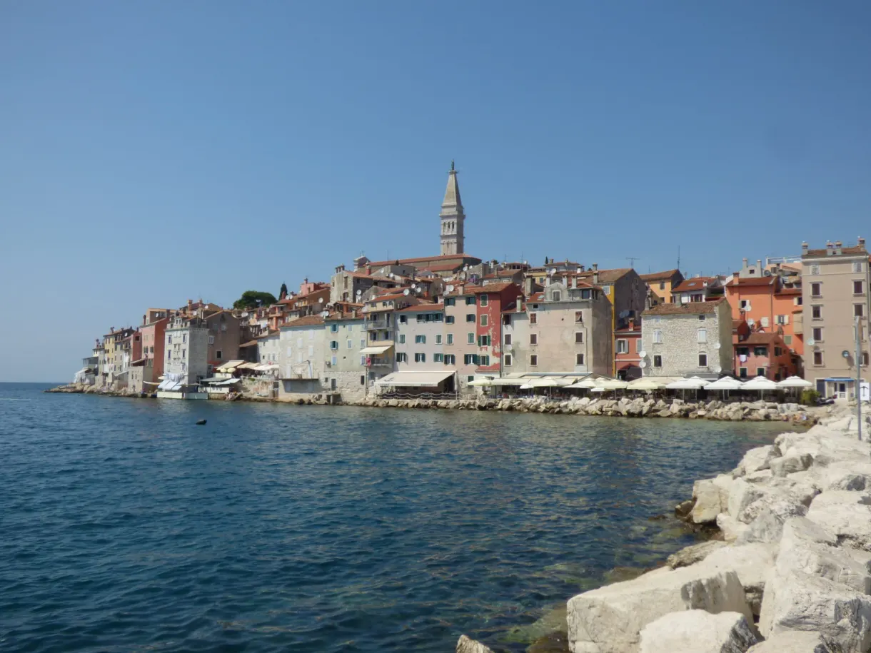Old town of Rovinj seen from the white rocks of the shore