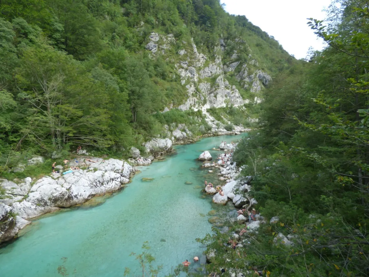 Bend in the river between the wooded slopes