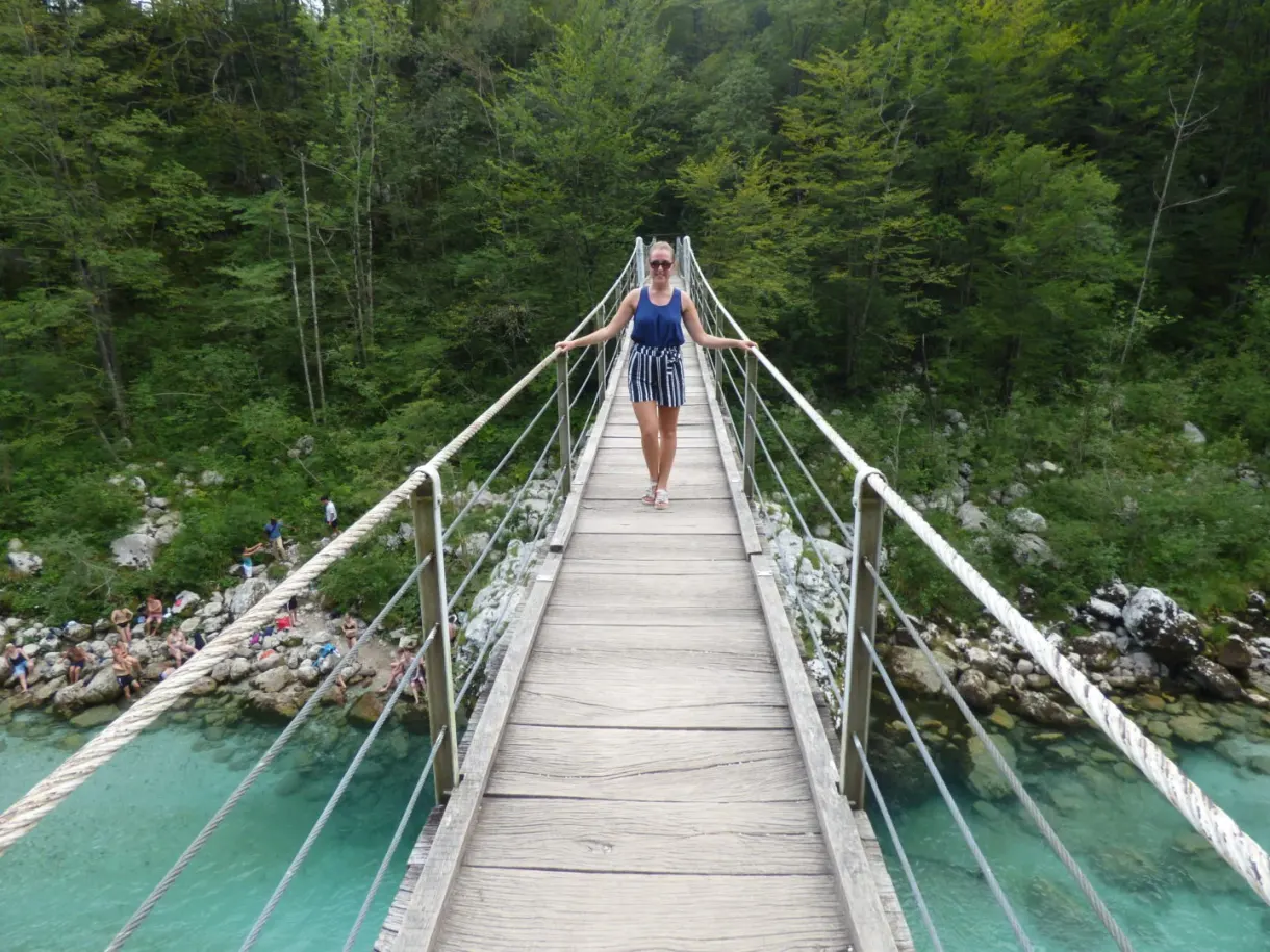 Crossing a suspension bridge above the river