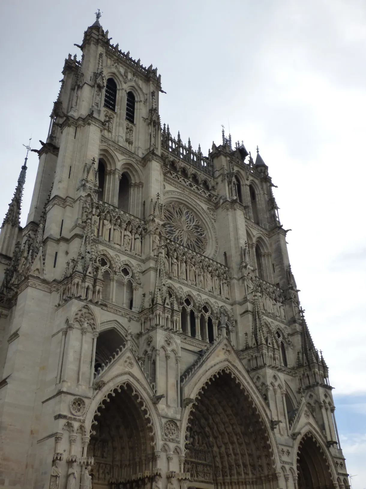 Low angle view of the gothic facade of Amiens cathedral