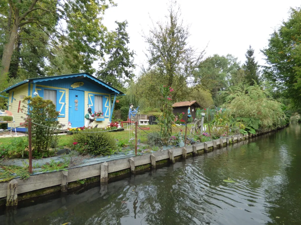 Blue gardener's hut beside the canal of the hortillonnages
