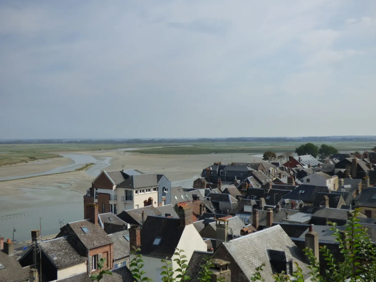 Rooftops of the lower town and the bay uncovered by the tide