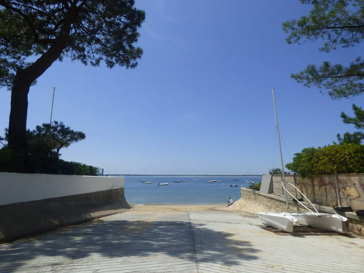 Slipway and catamarans at the edge of the basin